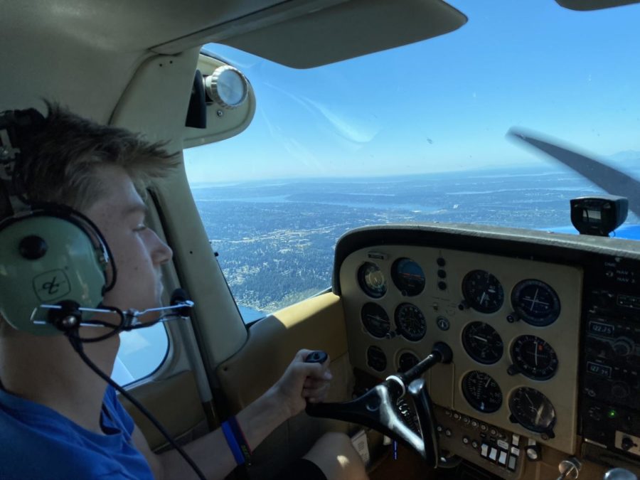 Senior Cole Barger flies toward his pilot license